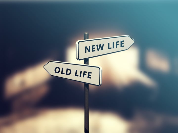 Street sign the direction way to NEW LIFE versus OLD LIFE